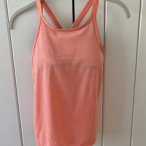 Athleta Girl coral/peach tank.  Girls size 8-10